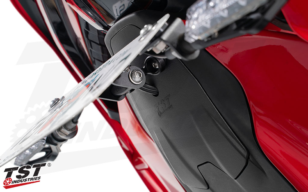 Lightweight mounting hardware installs on the back of your license plate.