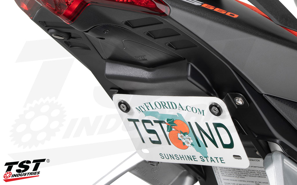 Mount your license plate in a low position tucked under the tail.