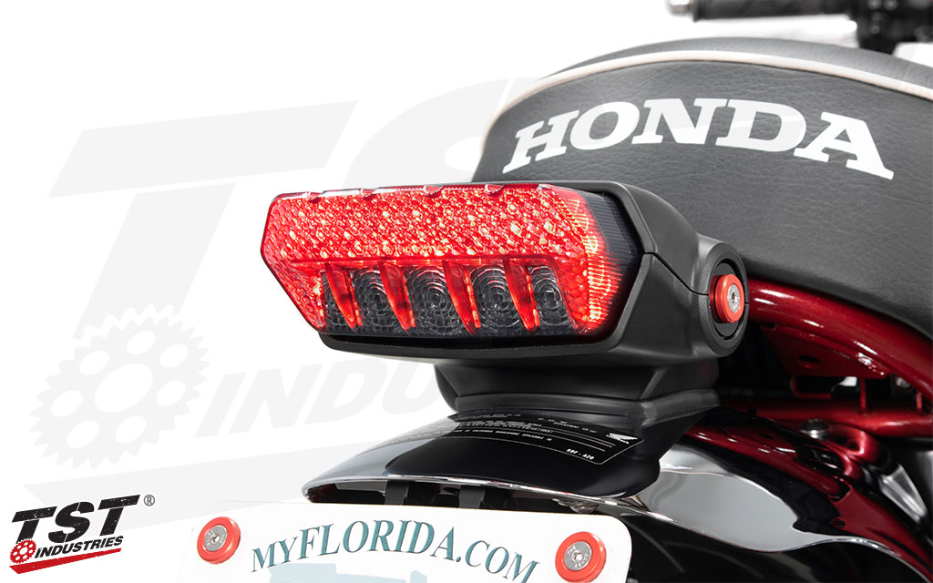 Bright LEDs create a unique running light design that complements the lines of the Honda Monkey.