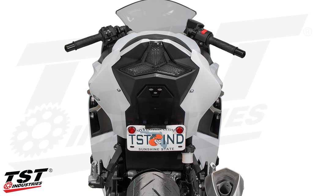 Remove the bulky factory fender and tuck your license plate low under the seat.