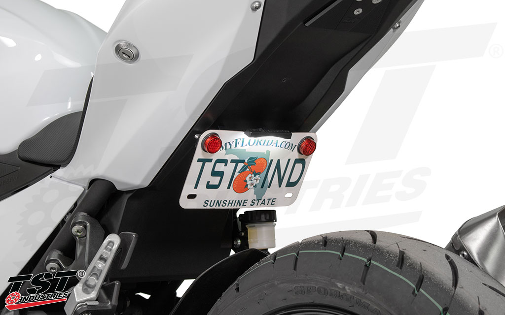 Mount your Ninja 400 / Z400 license plate in tucked low position under the tail section.