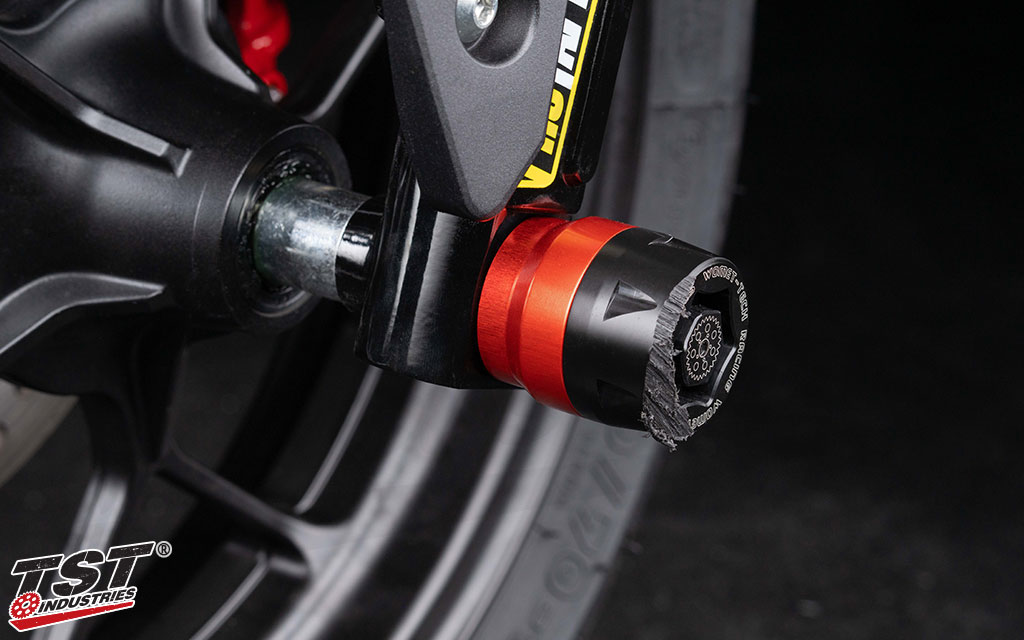 These axle sliders helped to protected this Honda Grom when one of our team members crashed his bike.