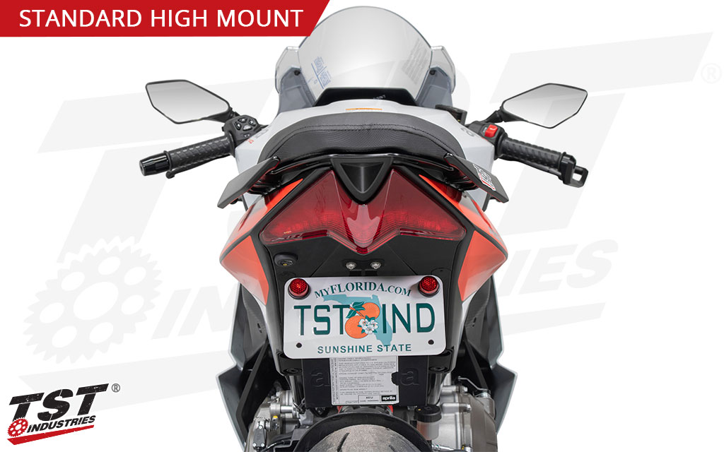 Mount your license plate in a fixed position high mount location similar to stock, just without the extra bulk.