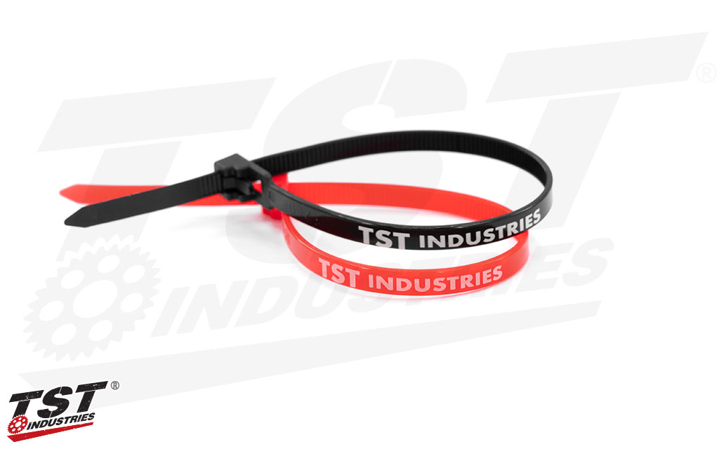 Each zip tie features TST Industries text.