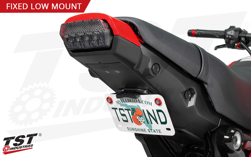 Keep your license plate visible while not hanging it off of the back of the tail of your Grom.