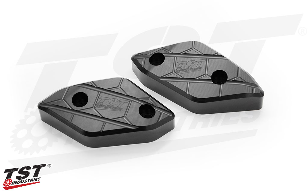CNC machined delrin sliders provide initial impact absorption and a replaceable sliding surface.