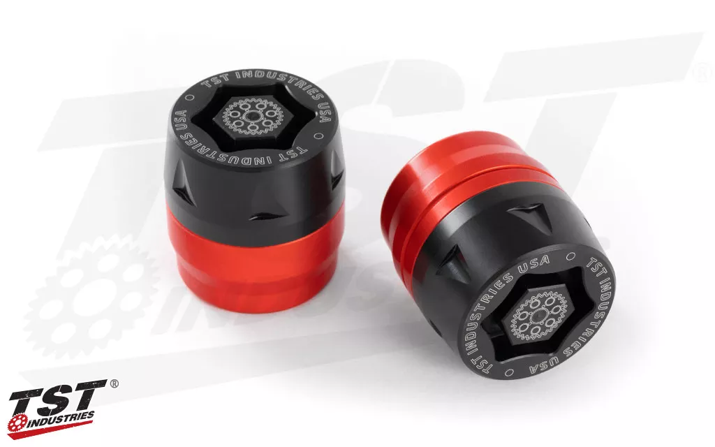 Anodized Red Rear Axle Sliders from TST Industries.
