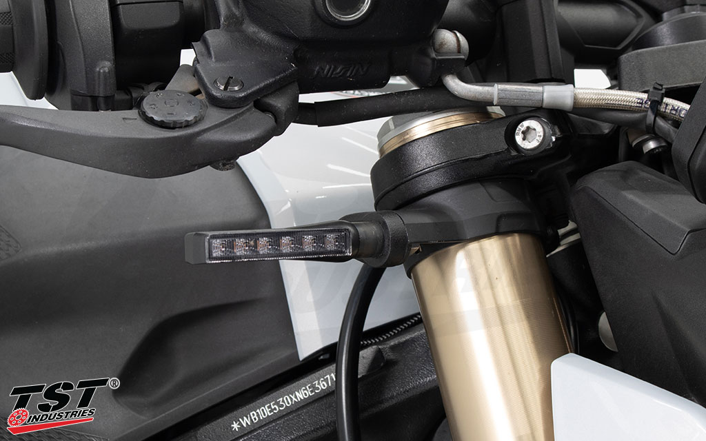 Securely fit aftermarket stud style turn signals using our TST Pod Turn Signal Mount Adapter Kit.