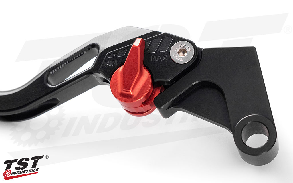 Anodized red adjuster enables you dial in the lever pull distance to suit your hand.