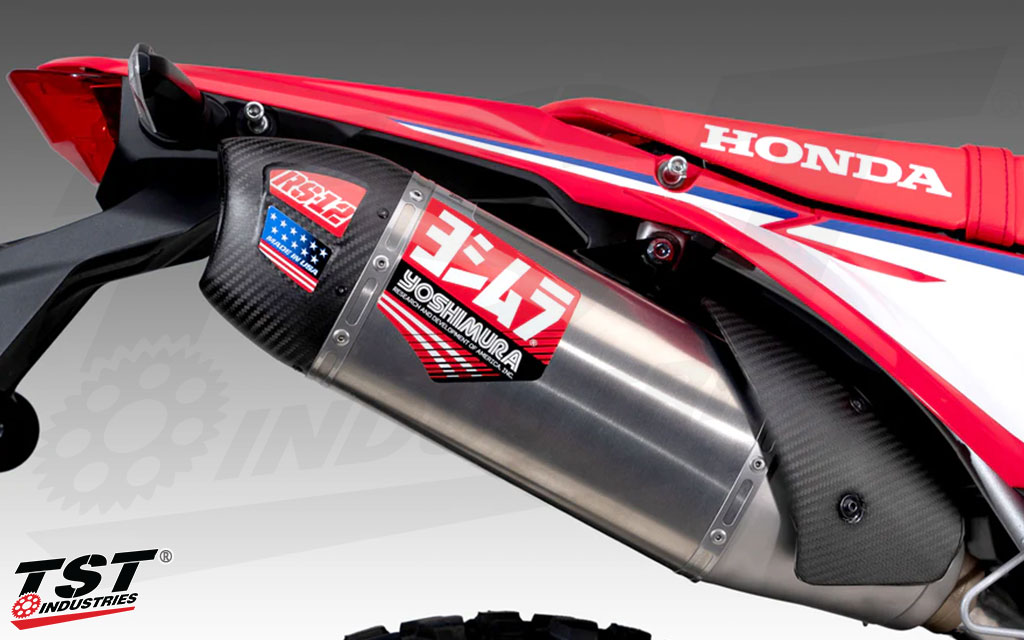 This Race Series RS-12 exhaust canister features Yoshimura branding and carbon fiber exhaust cap.