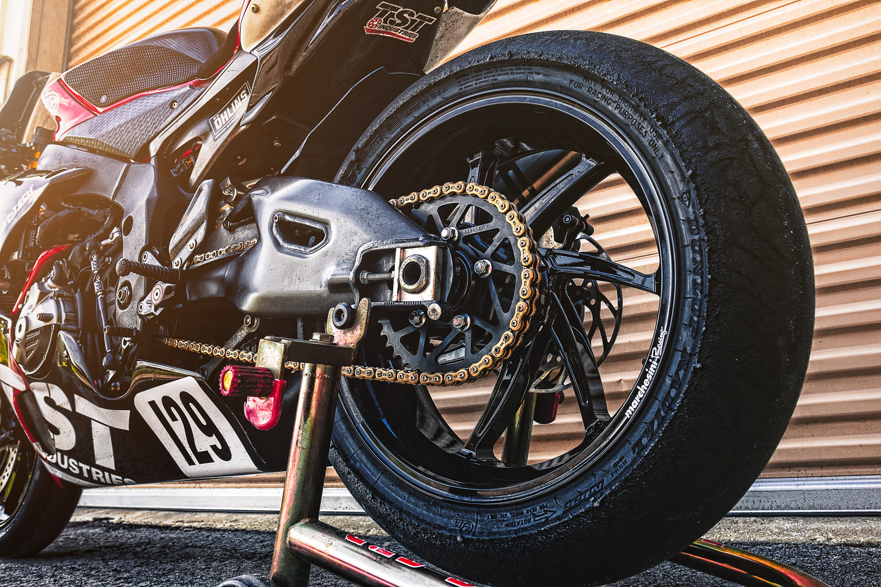 The TST Race YZF-R1 showing off it's high performance wheels and swingarm assembly.